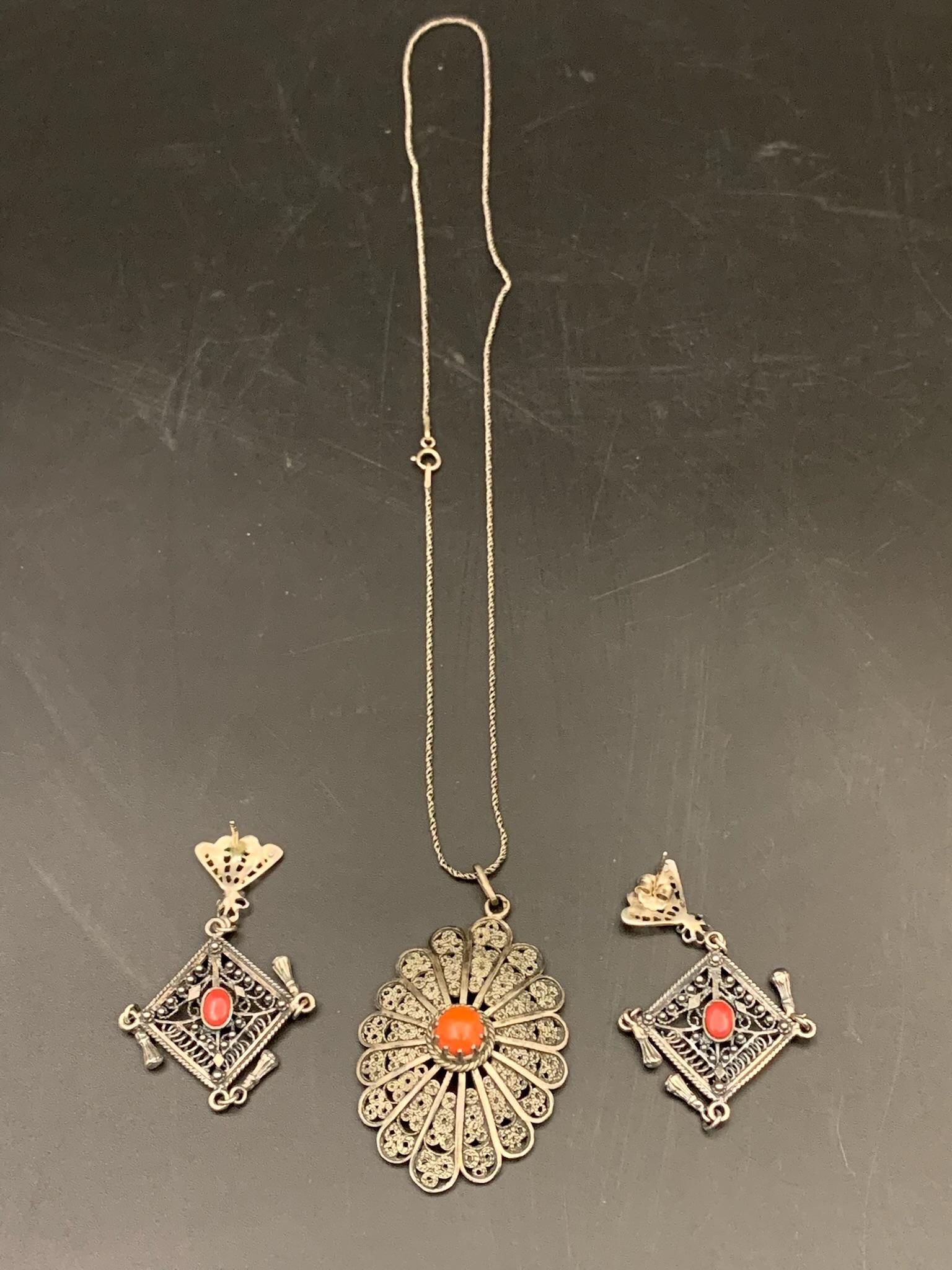 A set of sterling silver coral necklace,: a beautiful sterling silver necklace and 2 pairs of earing with coral inlaid marked 925; Necklace L: 25"