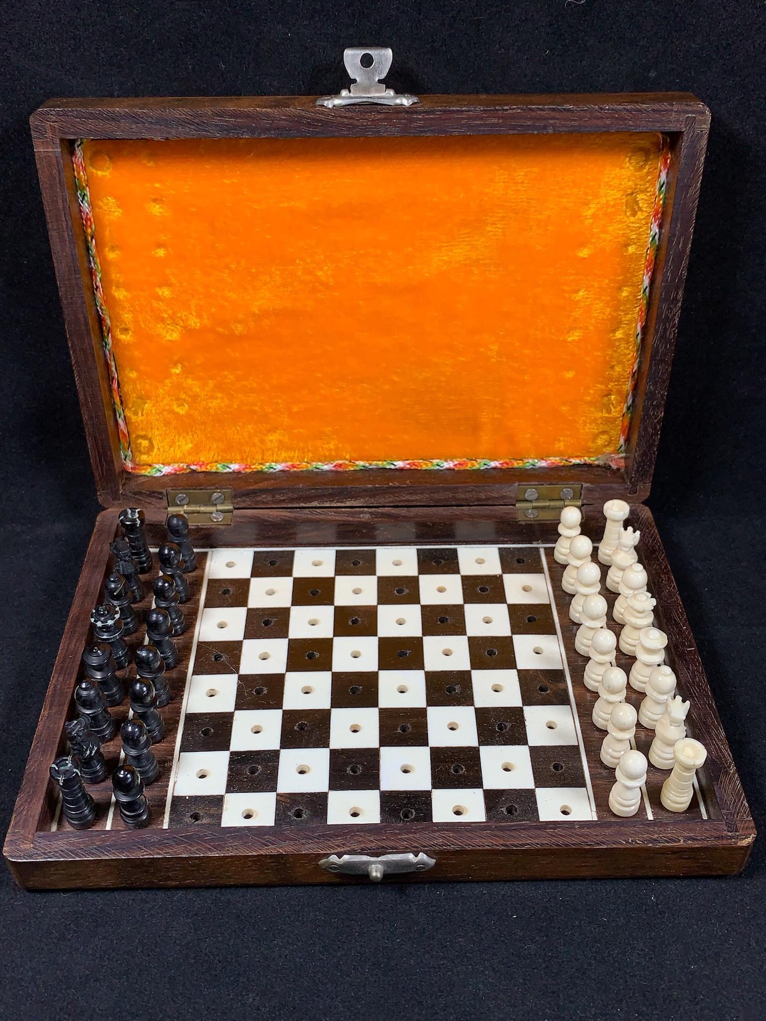 A vintage/antique bone chess set: vintage/antique bone chess set; 6.75"x4.75"x1.25"