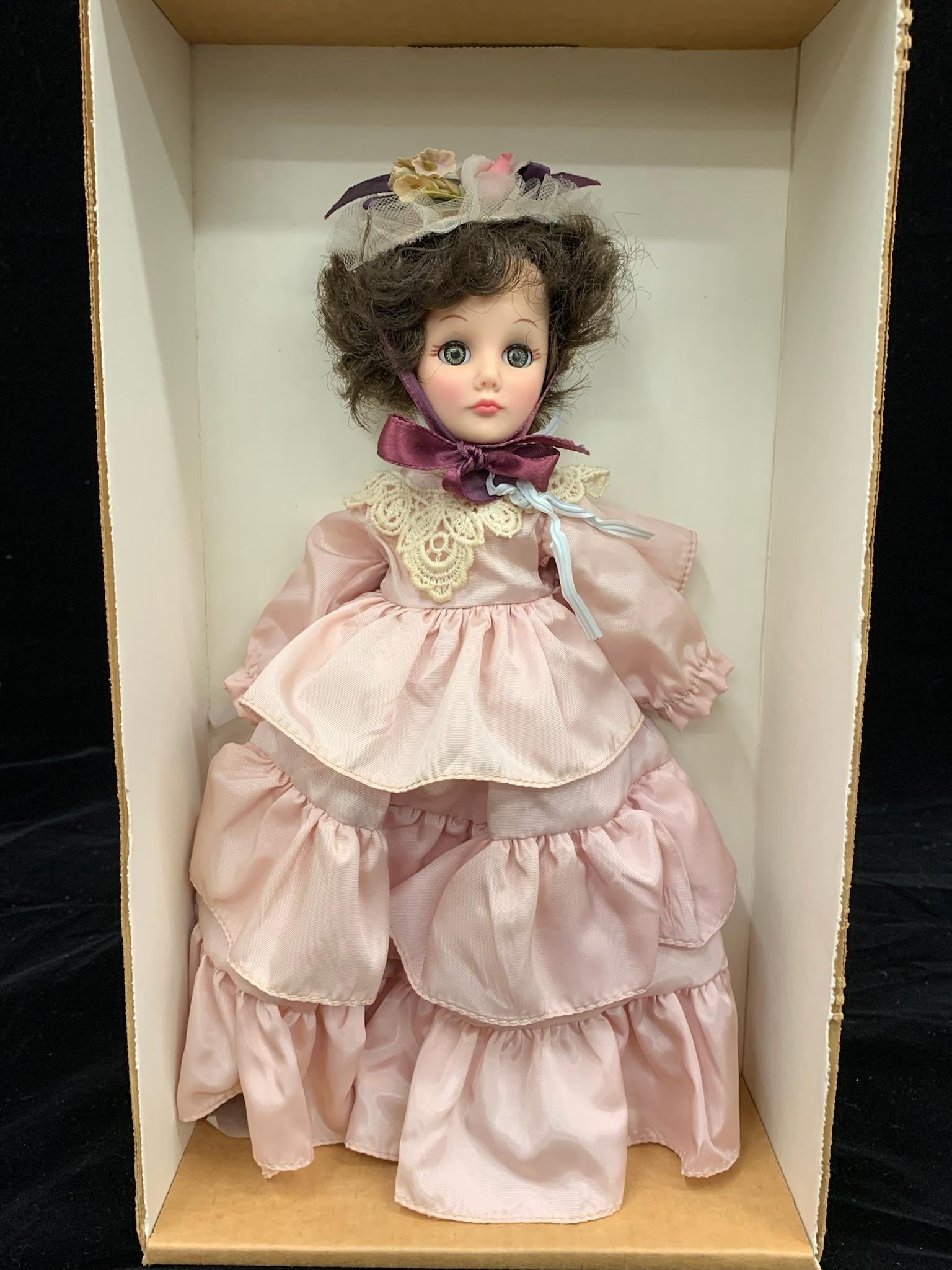 A Effanbee's grandes Dames collection porcelain doll with original box: Effanbee's grandes Dames collection porcelain doll with original box; 15.25" x 8.3" x 4.4"