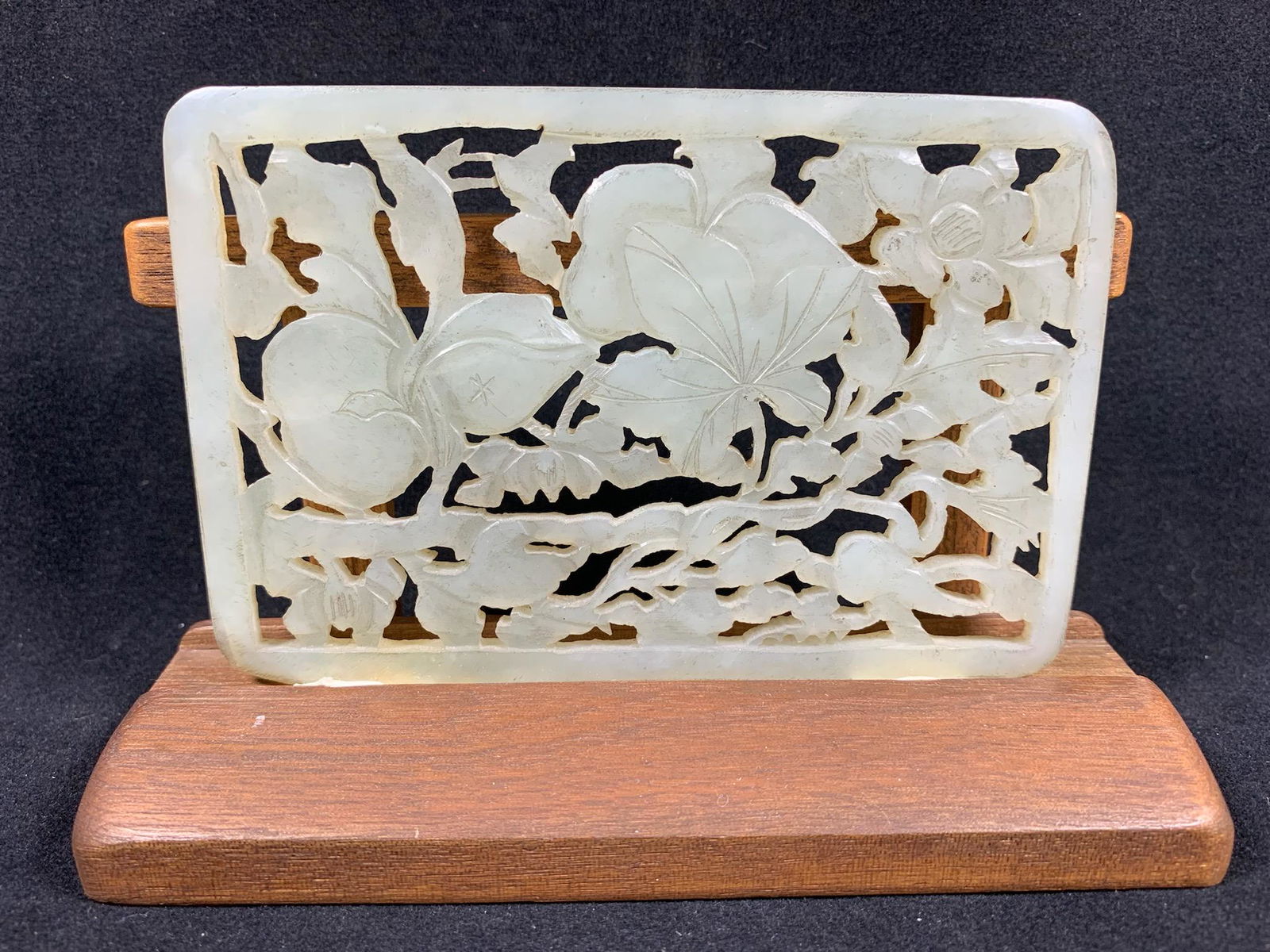 A chinese antique jade carved plaque on stand: chinese antique jade carved plaque on stand; 4.75" x 3.1"