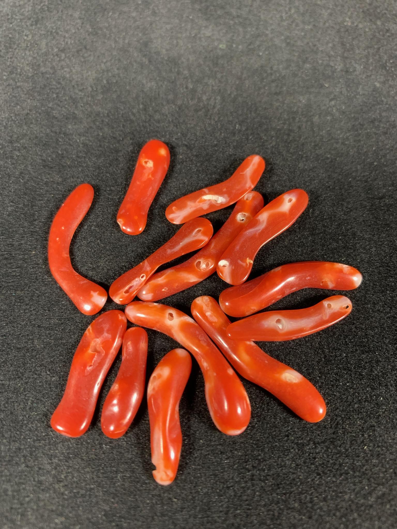 A group of Aka coral pieces: 3cm