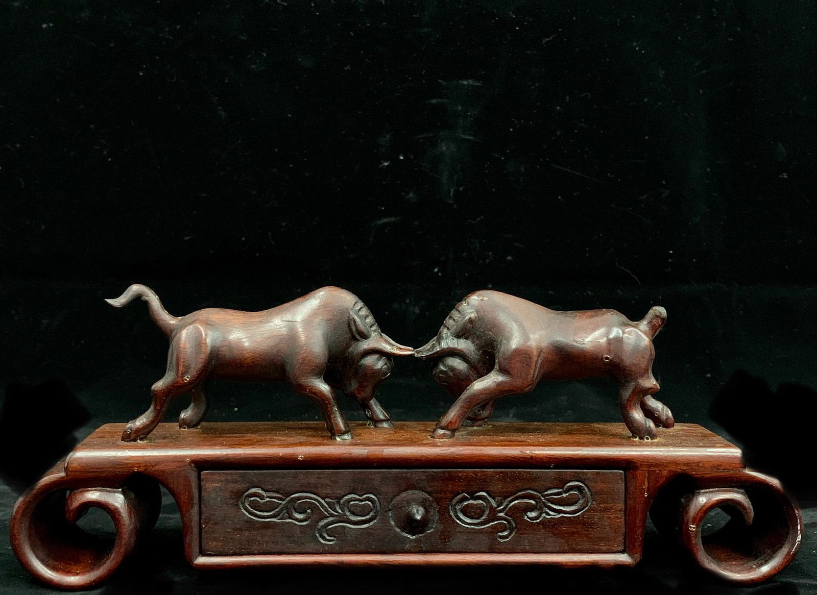 A fine chinese antique rosewood table stand with carved bulls: fine chinese antique rosewood table stand with carved bulls; L: 11"; H: 4"