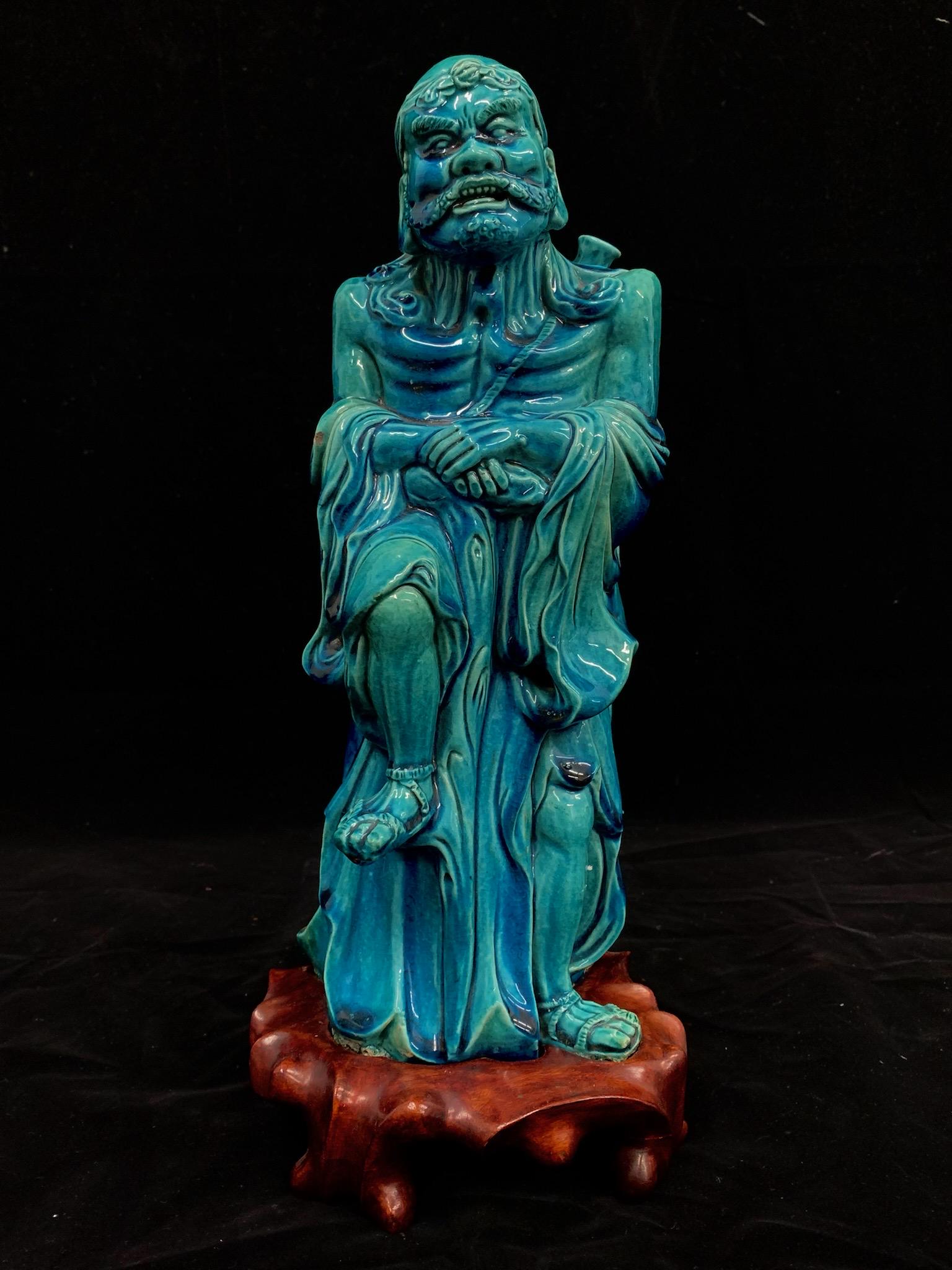 A fine chinese antique blue glazed porcelain fairy figure on rosewood stand: fine chinese antique blue glazed porcelain fairy figure on rosewood stand; H: 13.5"