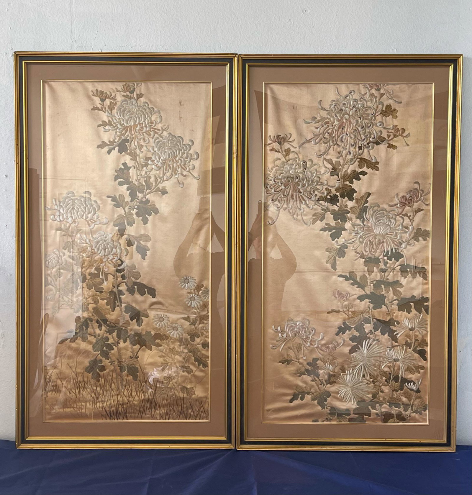 A pair of chinese floral theme silk embroidery: pair of chinese floral theme silk embroidery; framed; 42”x23.5”