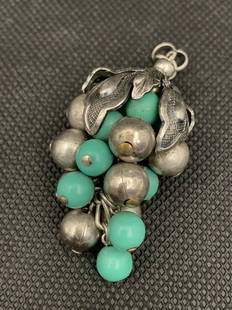 A beautiful silver and turquoise bead necklace: beautiful silver and turquoise bead necklace; 2.25"L