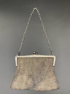 A fabulous sterling silver carved woven handbag: fabulous sterling silver carved woven handbag; marked; L: 10" x 5"