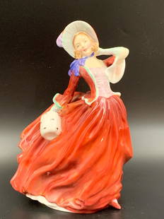 A vintage Royal Doulton HN 1934 "Autumn Breezes" porcelain figurine designed by Leslie Harradine: vintage Royal Doulton HN 1934 "Autumn Breezes" porcelain figurine designed by leading Doulton artist Leslie Harradine; H: 7.5"; perfect condition