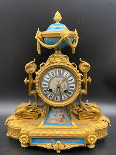 A fine handpainted victorian bronze mount clock with porcelain urn: fine handpainted victorian bronze mount clock with porcelain urn; H: 13.75"H