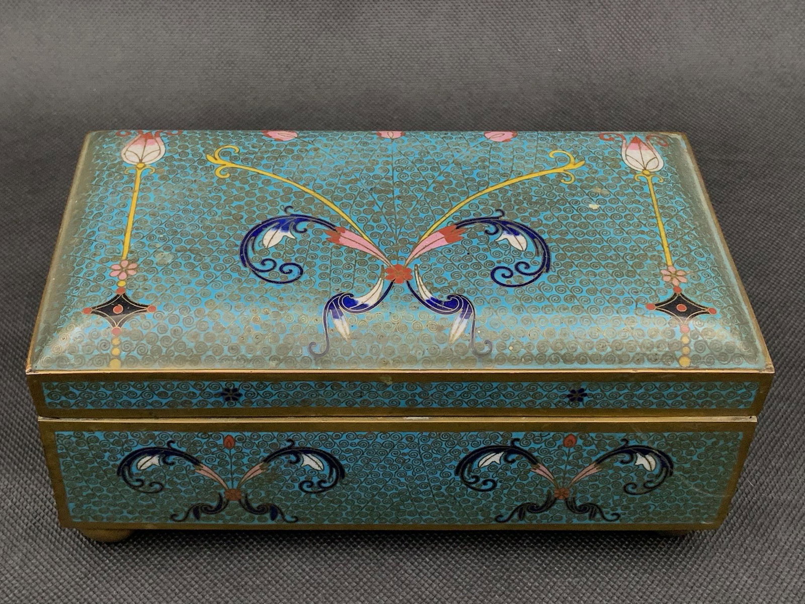 A chinese antique cloisonne box with export sticker: chinese antique cloisonne box with export sticker; 7.5" x 4.1" x 3"