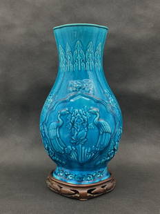 A fine chinese antique turquoise blue glazed porcelain vase with floral pattern and rosewood stand: fine chinese antique turquoise blue glazed porcelain vase with floral pattern; H: 13";