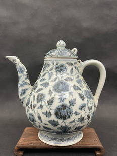 A rare chinese antique floral blue and white porcelain teapot: rare chinese antique floral blue and white porcelain teapot; H: 9.75"; stands not included