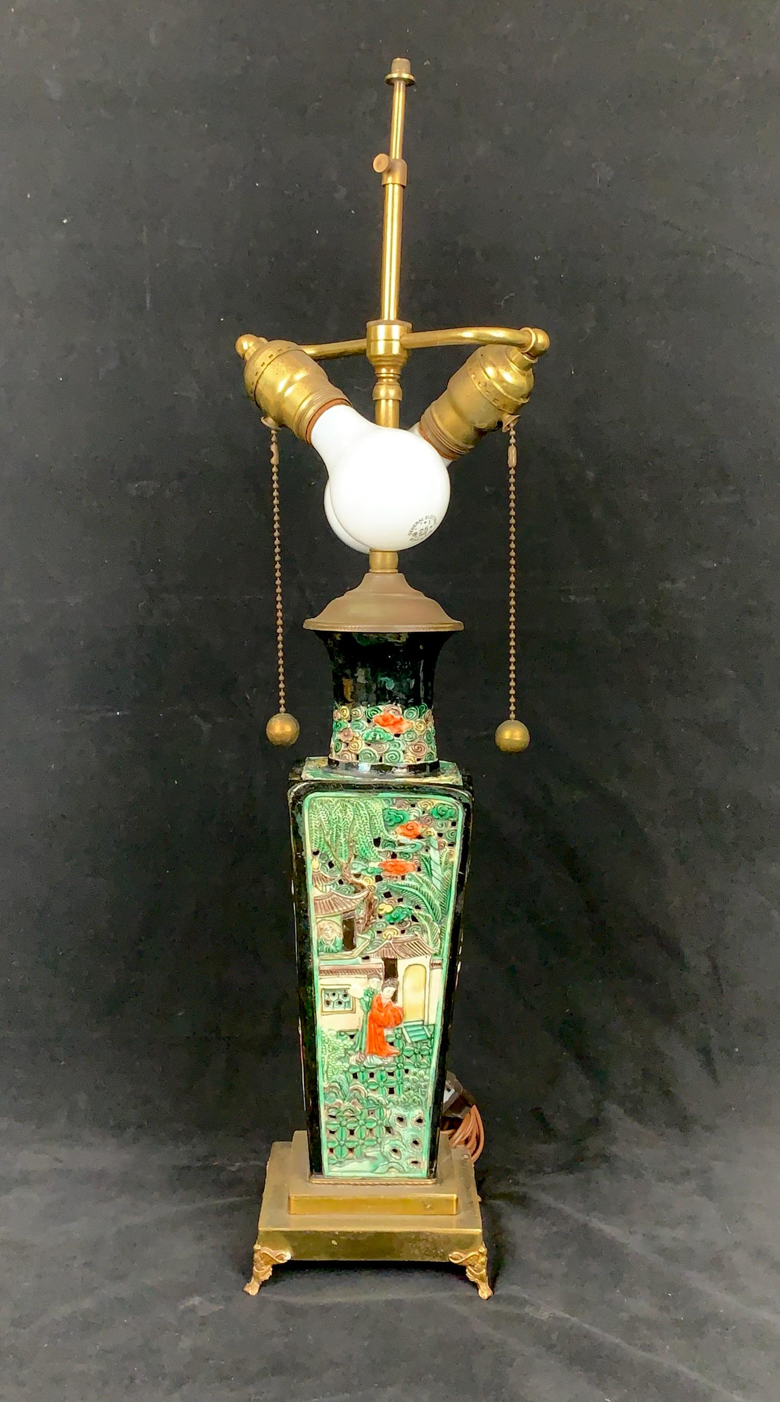 A chinese antique black glazed wucai carved porcelain vase made as lamp: chinese antique black glazed wucai carved porcelain vase made as lamp; H: 24.75"