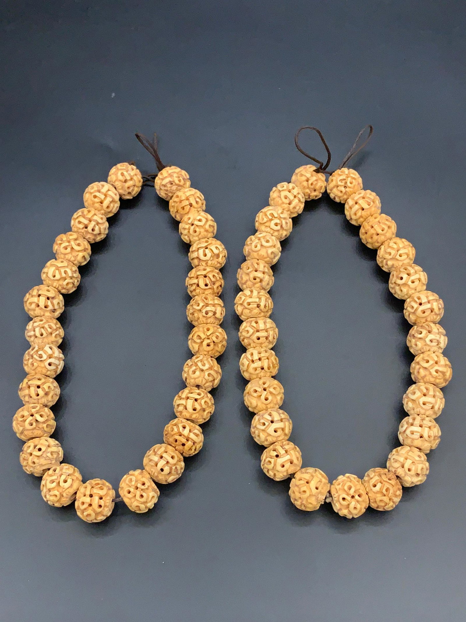 2 antique bone carved beads necklaces: L: 7"