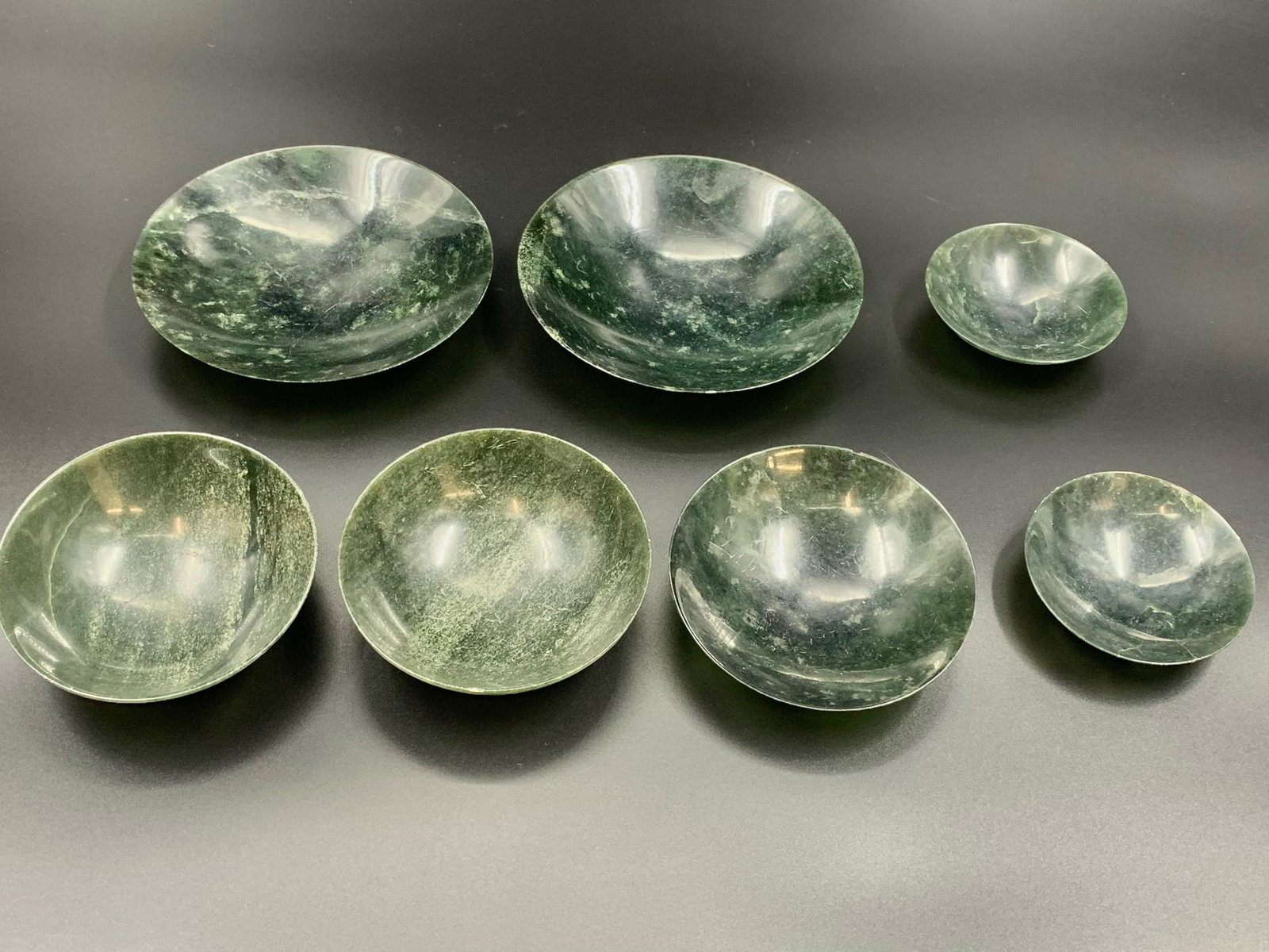 7 spinach jade carved bowls: D: 5"