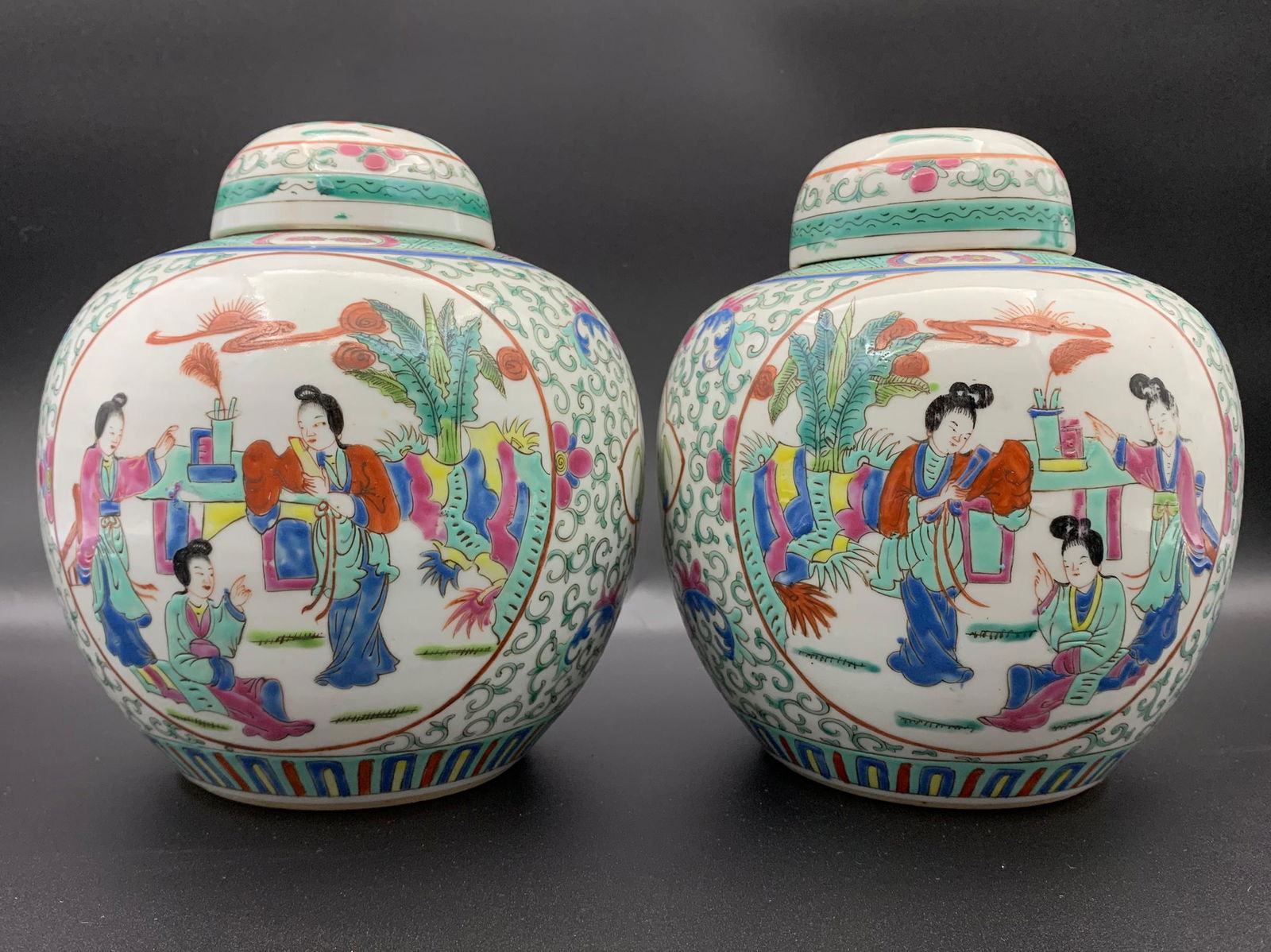 Pair of fine chinese antique famille rose figurine scene porcelain jars: 1 with slight crack on bottom; H: 7.5"