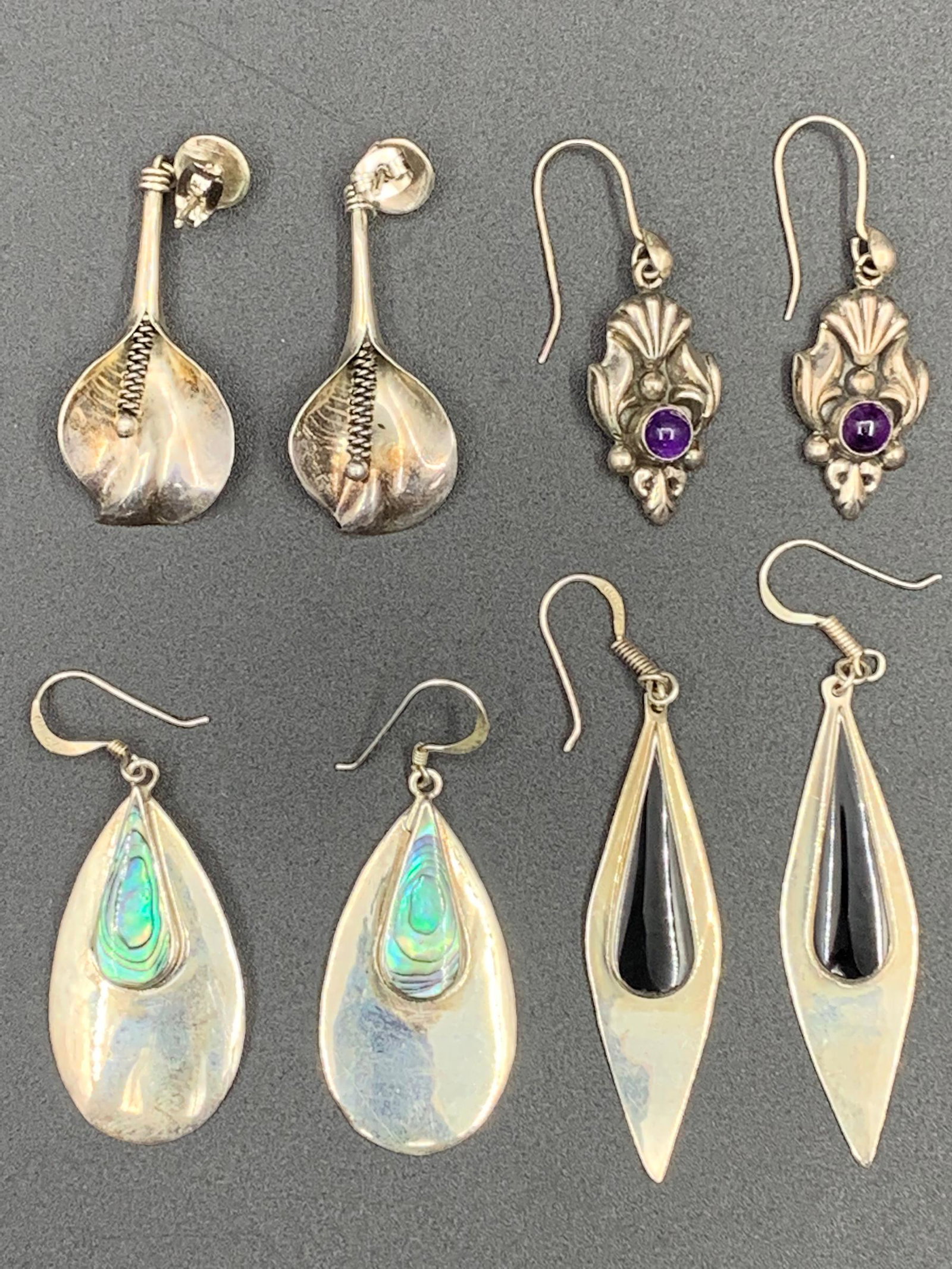 4 pairs of sterling silver earrings with mother of pearl, obsidian, and amethyst: 23.8g