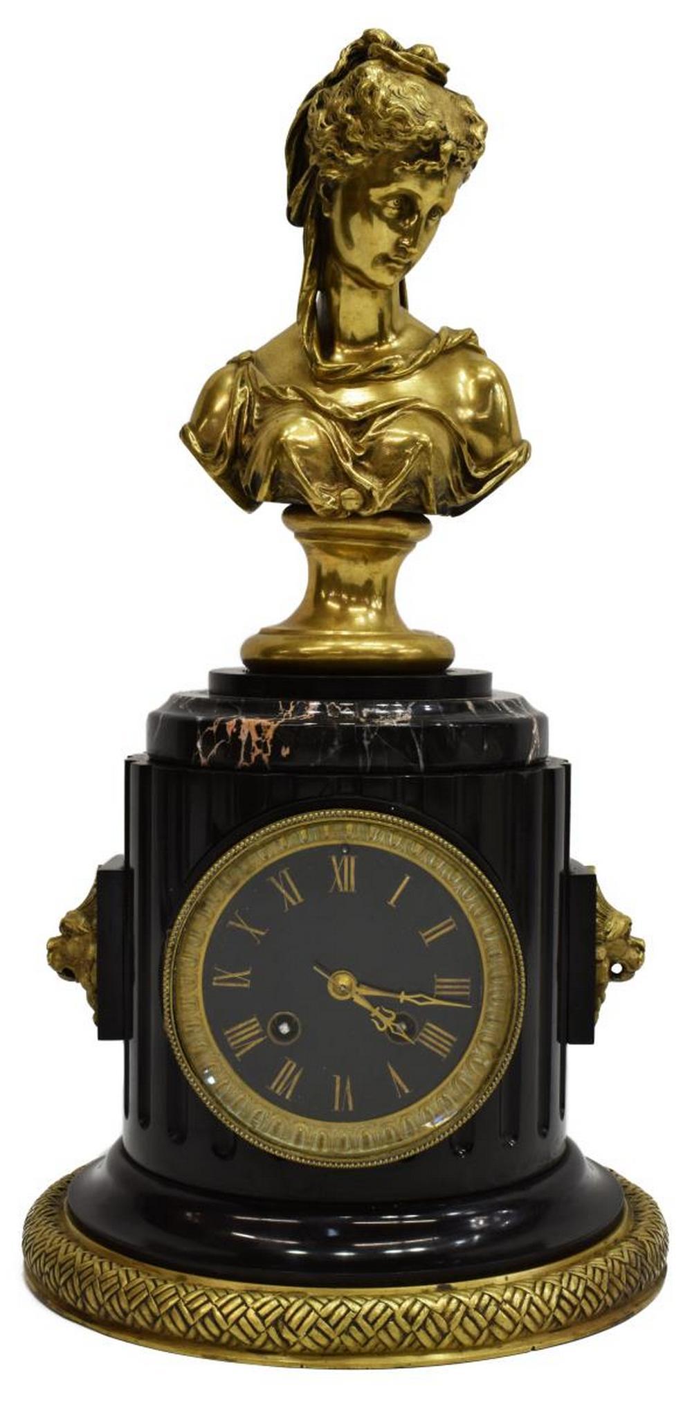 FRENCH GILT METAL FIGURAL MARBLE MANTEL CLOCK: French mantel clock, late 19th c., gilt metal figural topper of a female bust, signed in cast after Eutrope Bouret (France, 1833-1906), over marble case with lion's mask handles, housing dial with gil