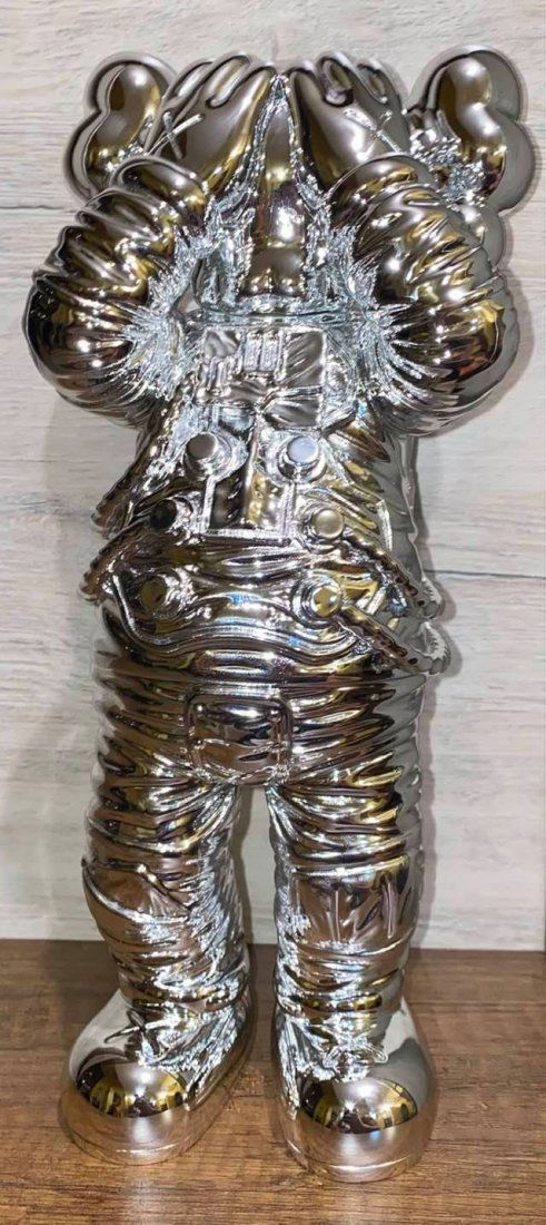 KAWS HOLIDAY SPACE FIGURE - SILVER (1 of 4)
