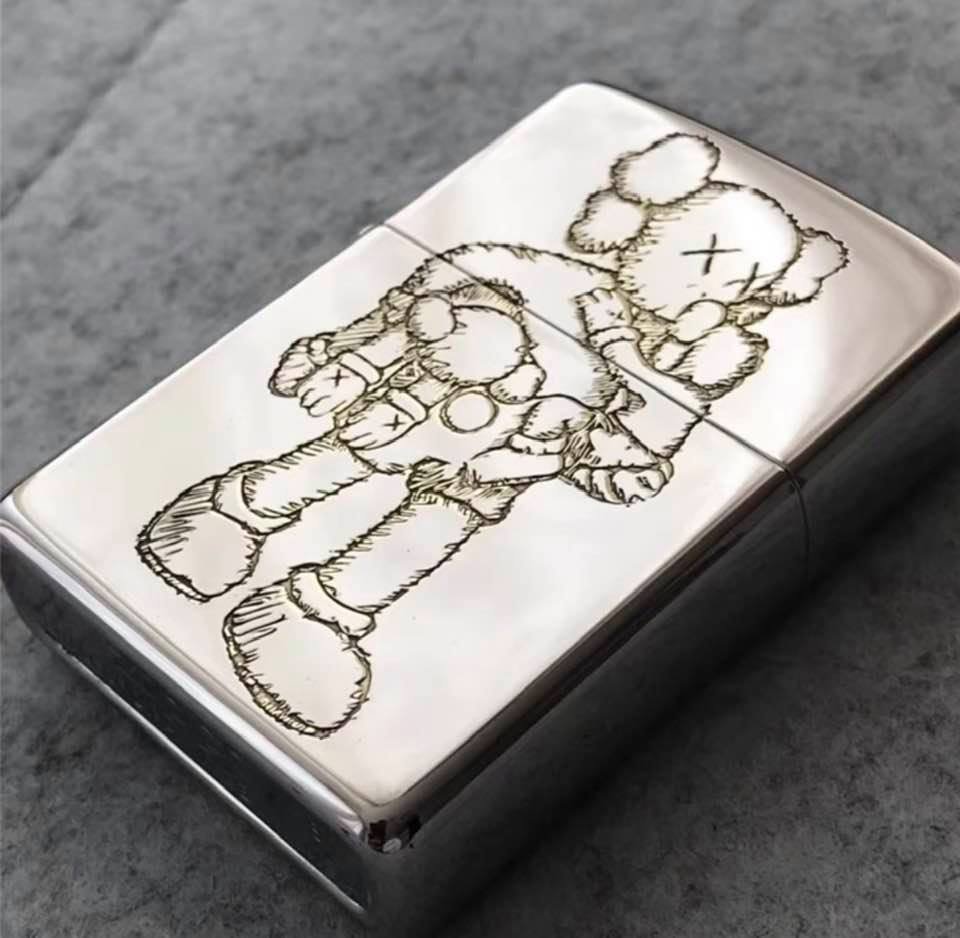 Kaws Zippo Lighter - Brand New: Kaws Zippo Lighter. 2 1/4" x 1 1/2"