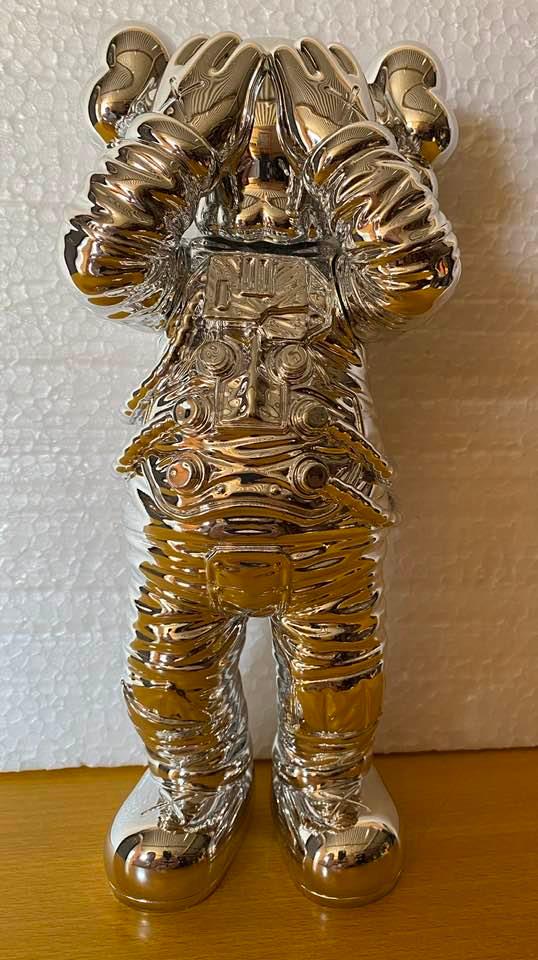 KAWS HOLIDAY SPACE FIGURE - SILVER (1 of 4)