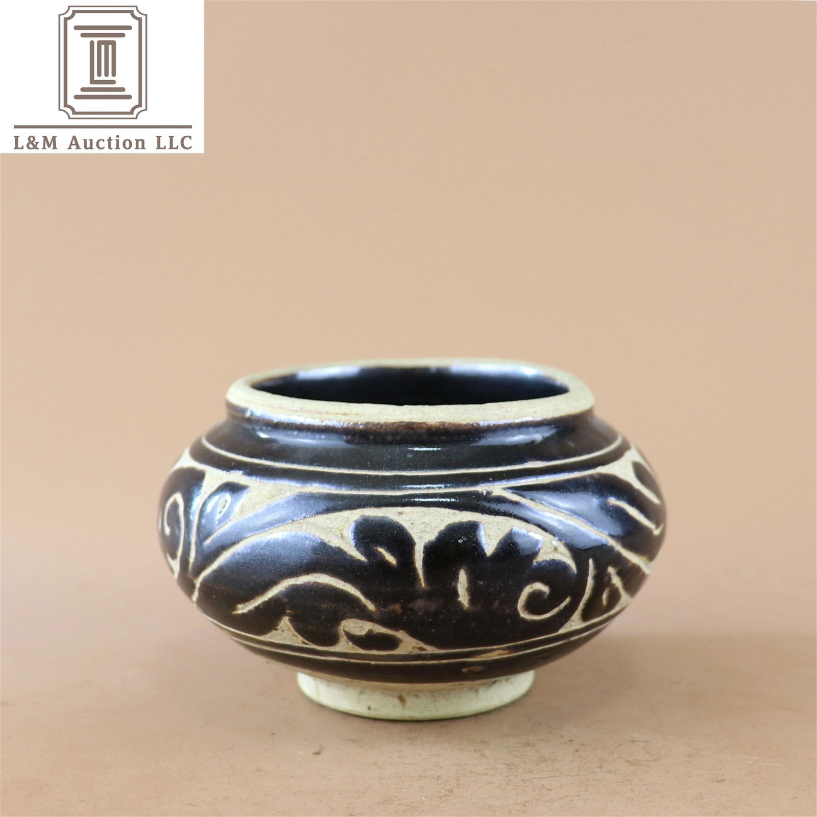 A Chinese Black Glazed Porcelain Jar (1 of 8)