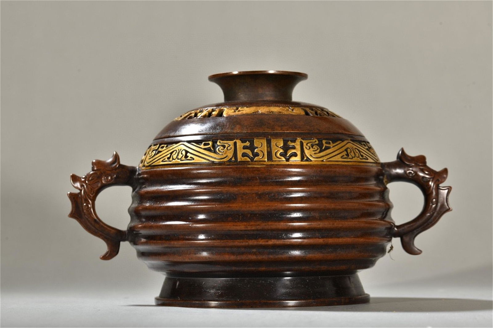 A Chinese Gilt Bronze Incense Burner with Dragon Ear (1 of 9)