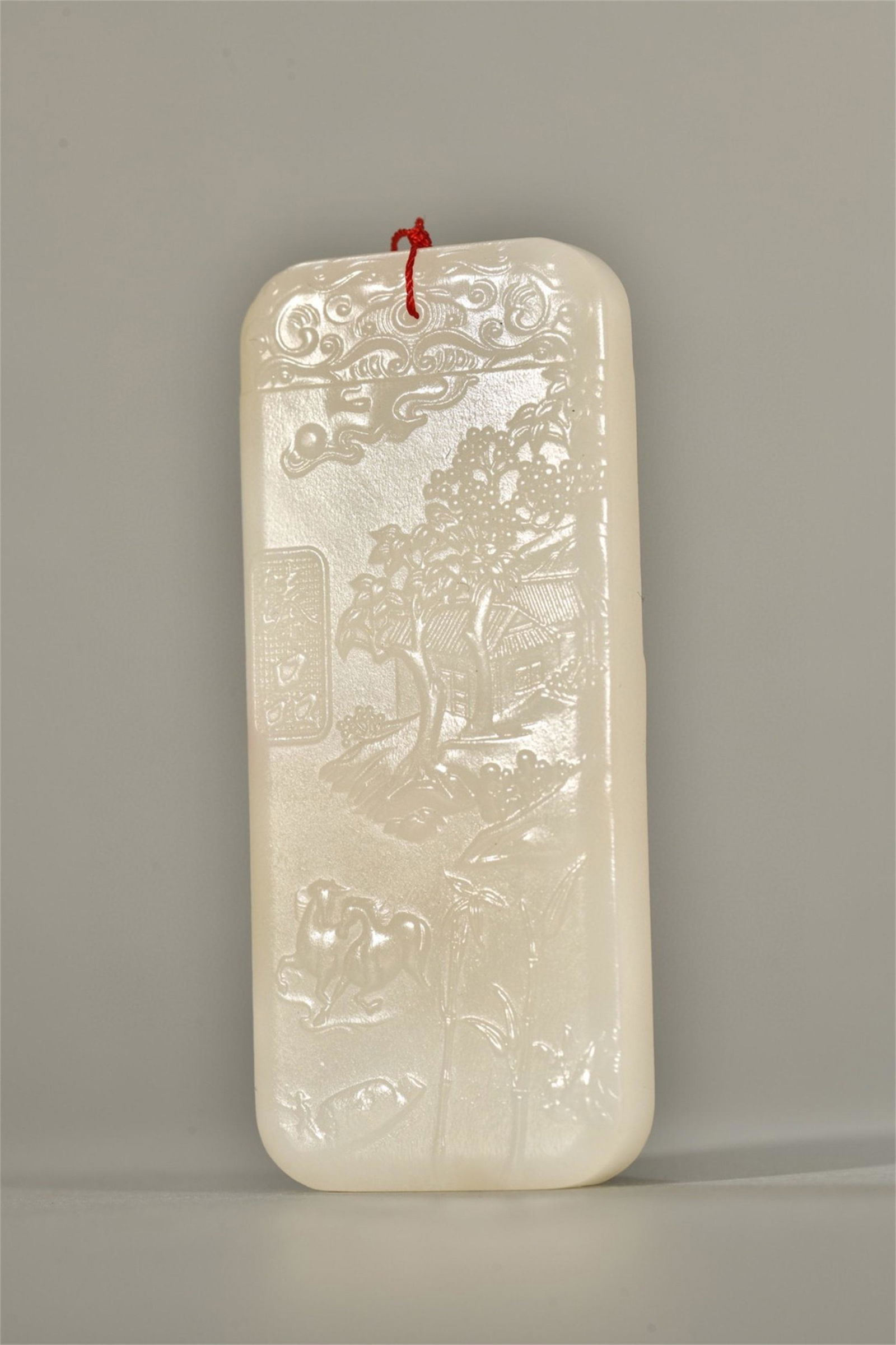 A Chinese Carved Jade Guanyin Patterned Pendant (1 of 9)