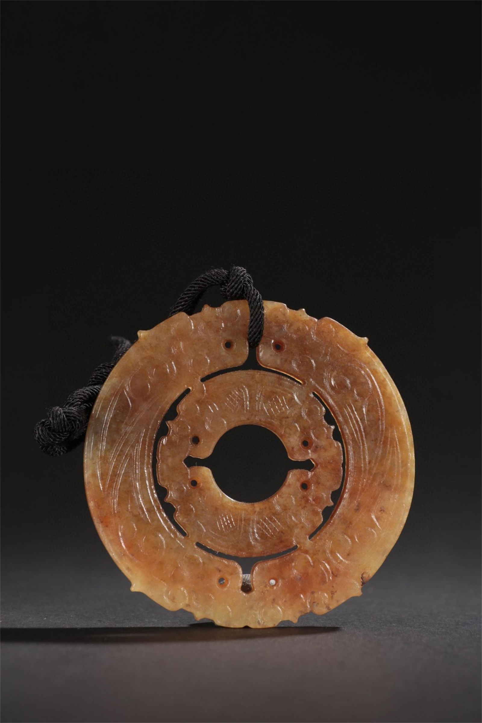 A Chinese Carved Jade Dragon Patterned Pendent (1 of 9)