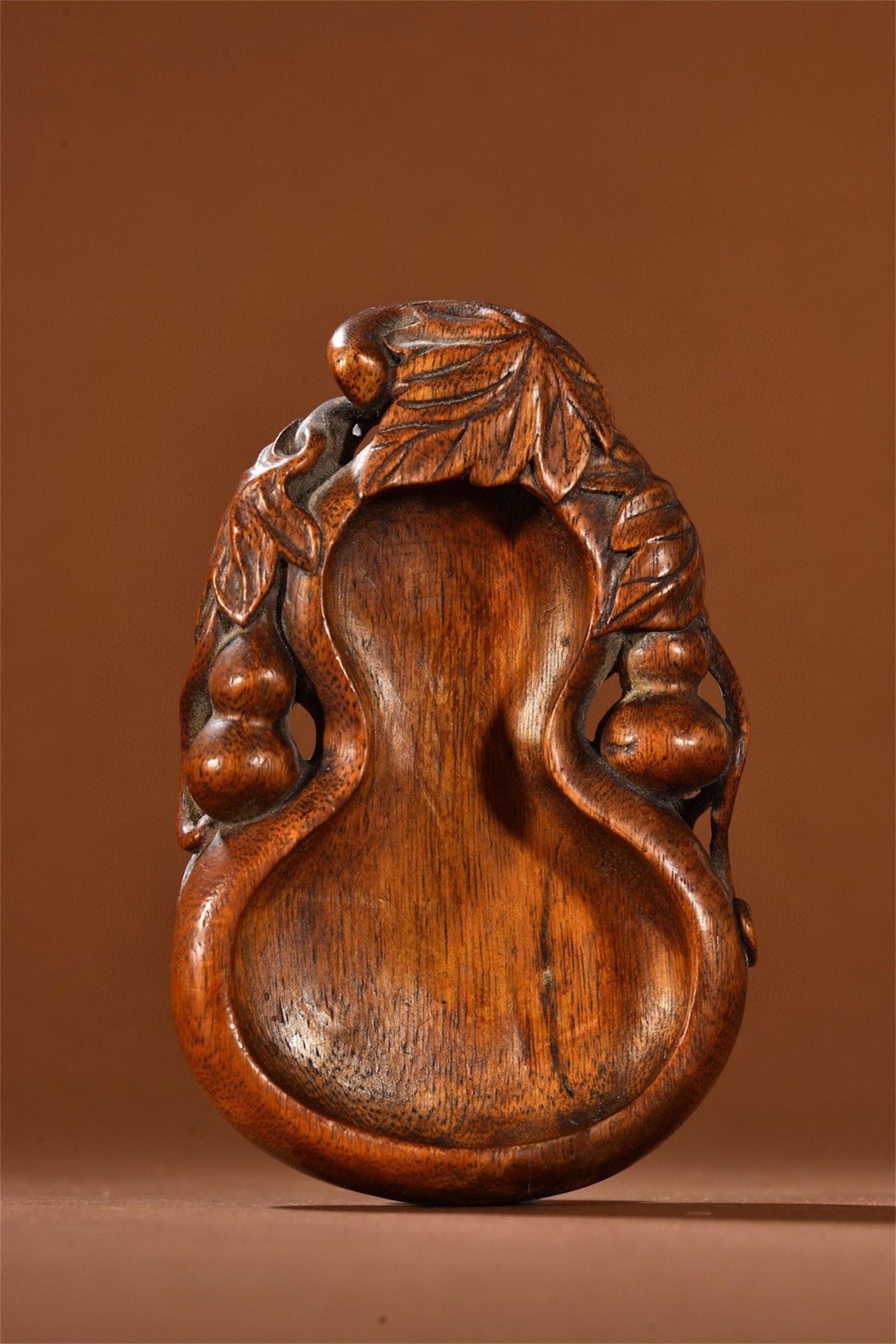 A Chinese Carved Agarwood Gourd Shaped Brush Washer (1 of 9)