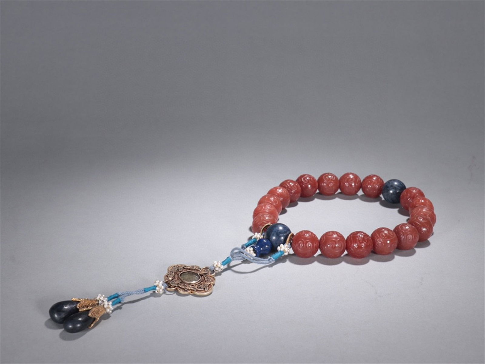 A Chinese Carved Agate Bracelet (1 of 9)