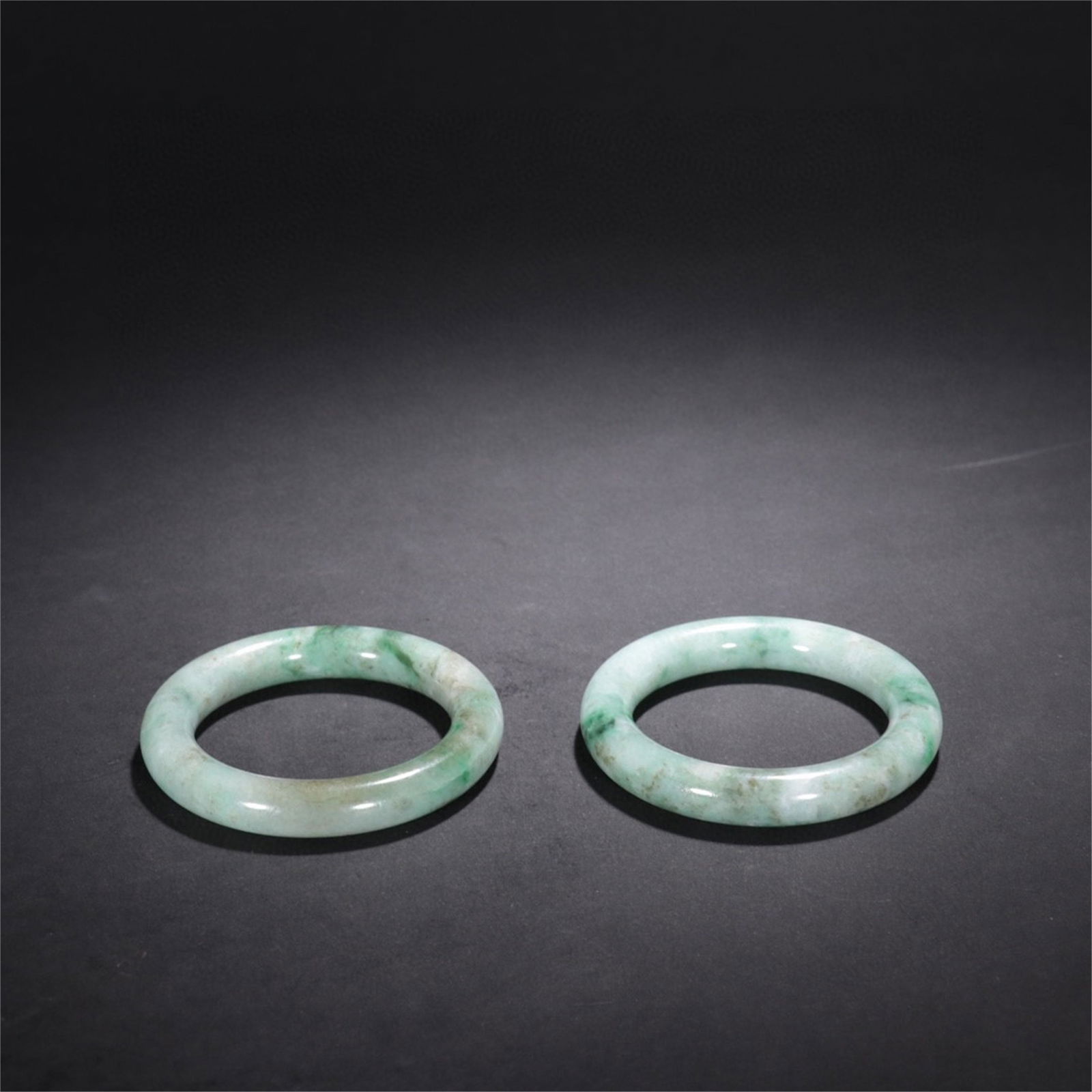 Pair of Chinese Carved Jadeite Bracelets (1 of 9)