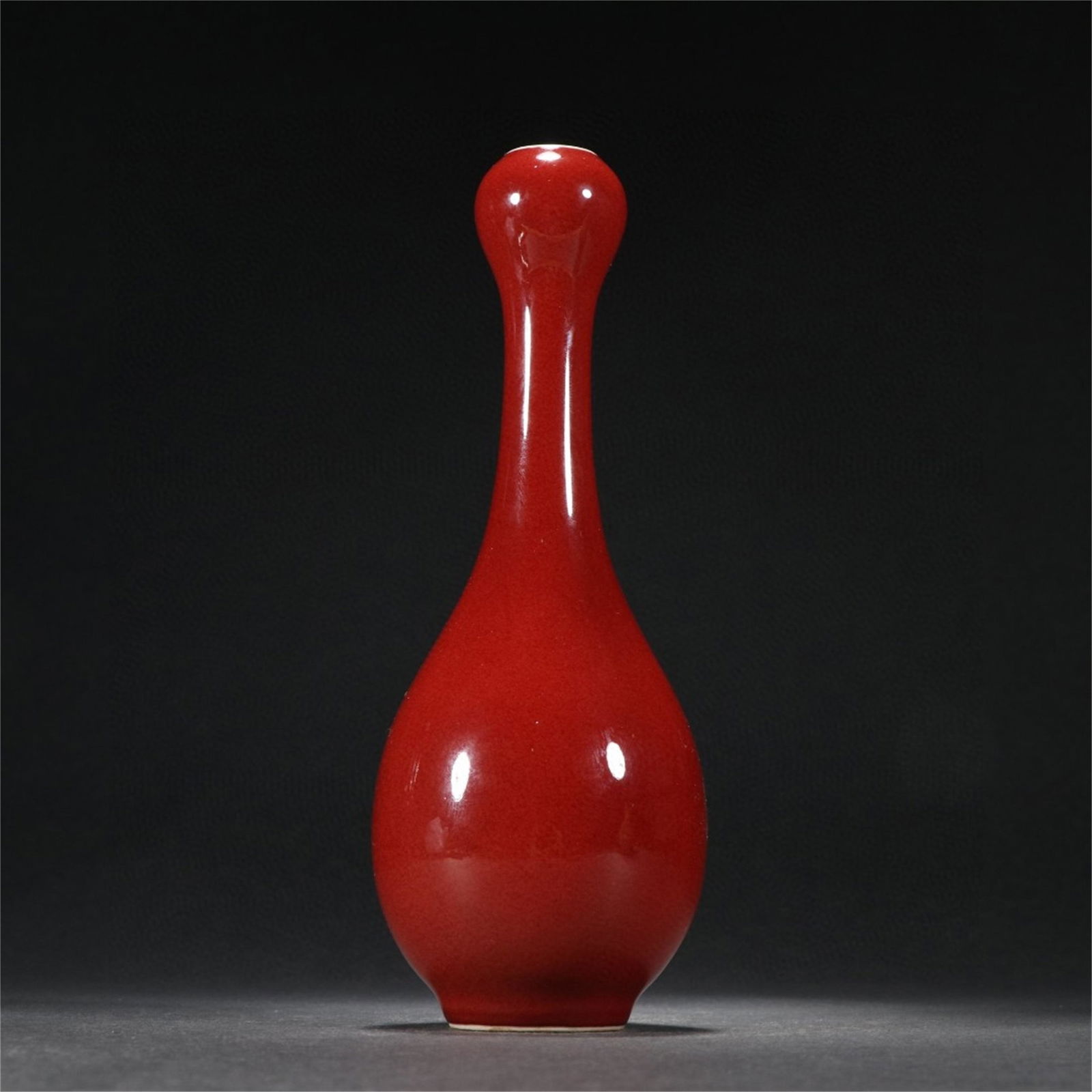 A Chinese Red Glazed Garlic-Mouth Porcelain Vase (1 of 9)