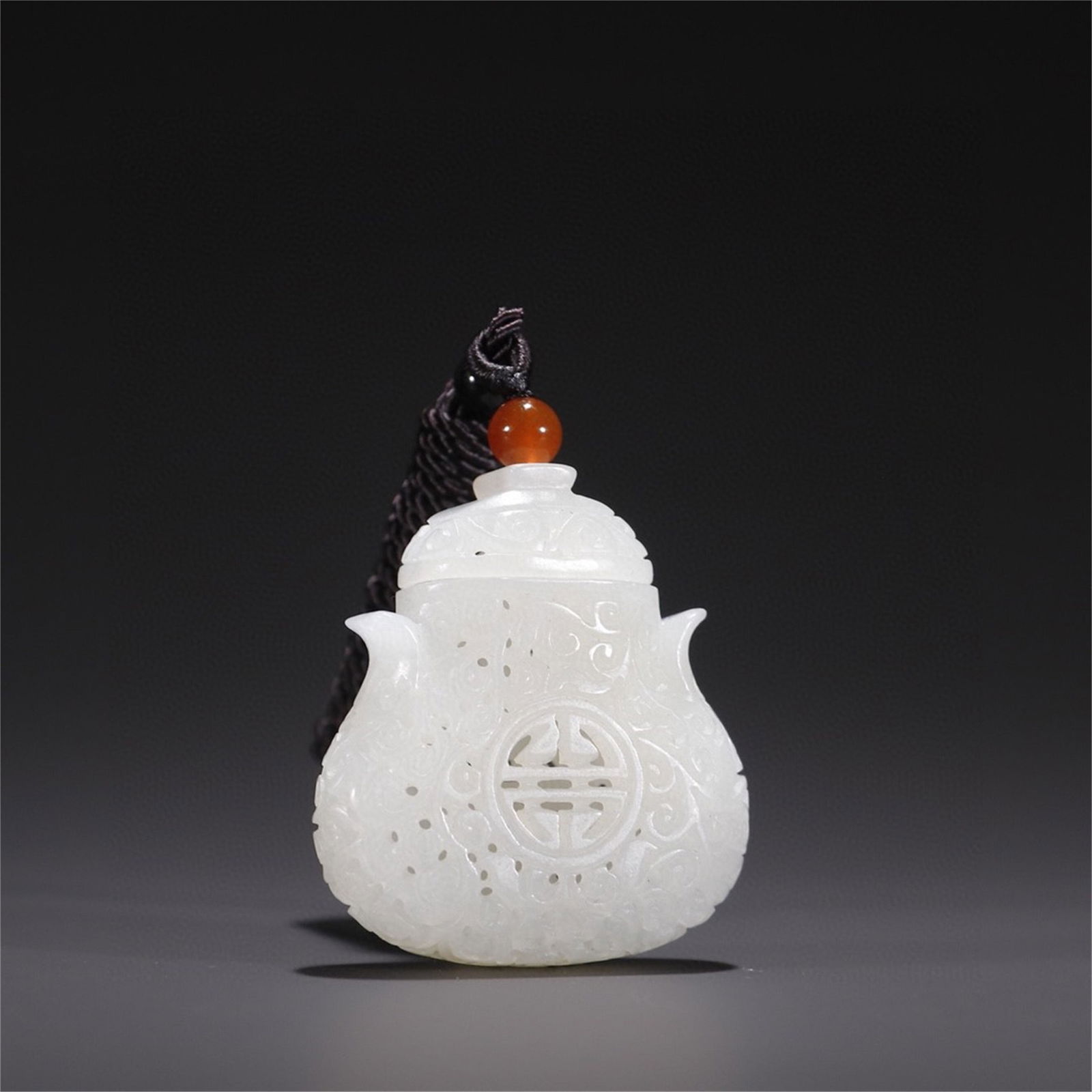A Chinese Carved Jade Sachet (1 of 9)