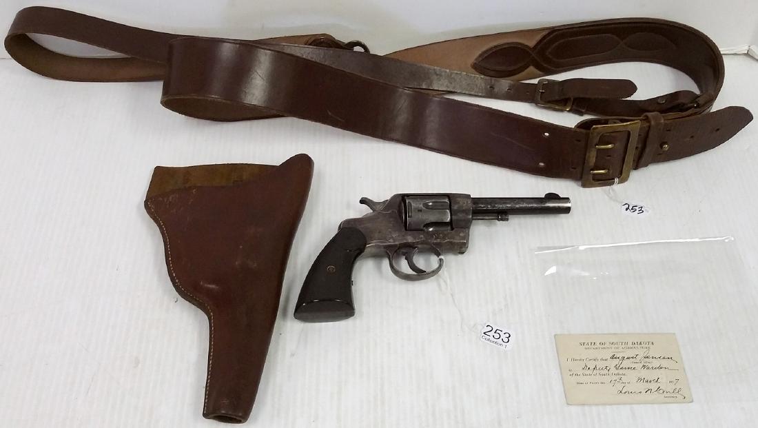 Colt double action .38 revolver with holster & shoulder: Colt double action .38 revolver with holster & shoulder strap/ belt with license & a cap (some bluing loss & pitting) *FFL Transfer Required