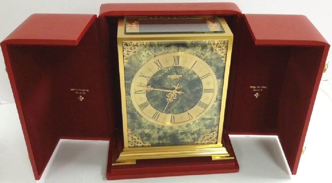 Patek Philippe Geneve solar powered clock in gilt (1 of 10)