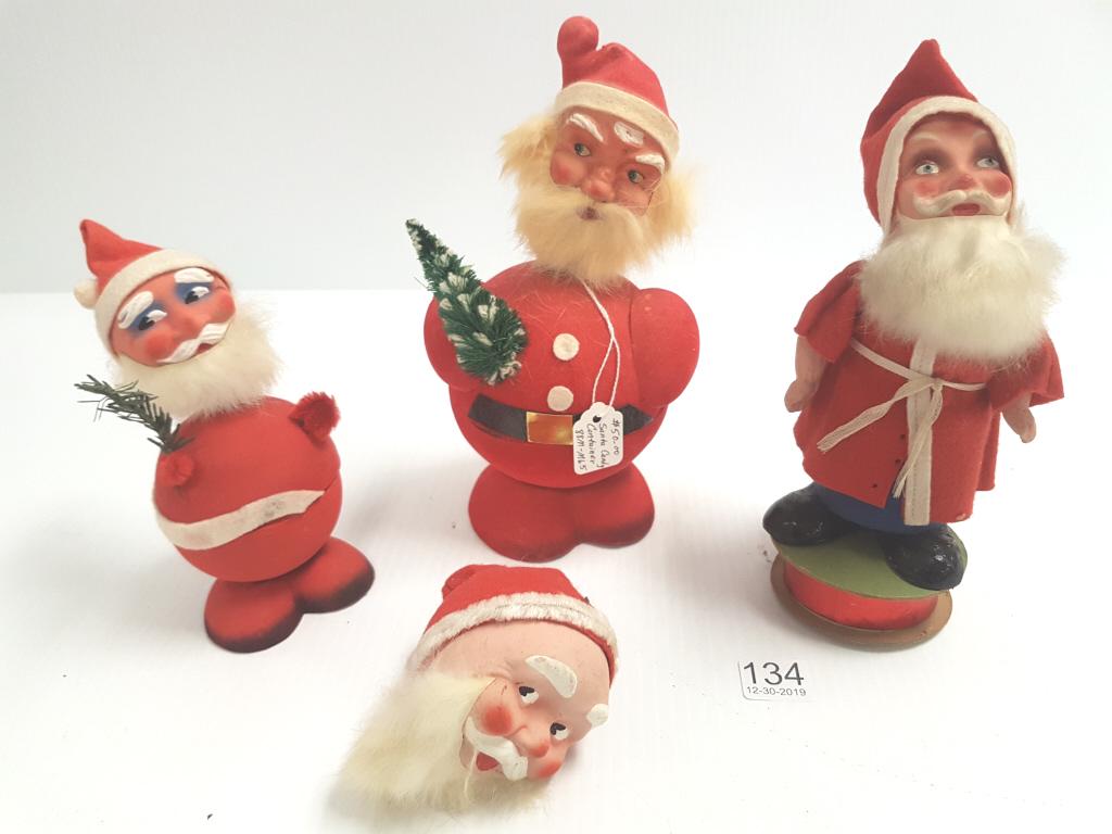 Four 8" etc German Santa candy containers: Four 8" etc German Santa candy containers