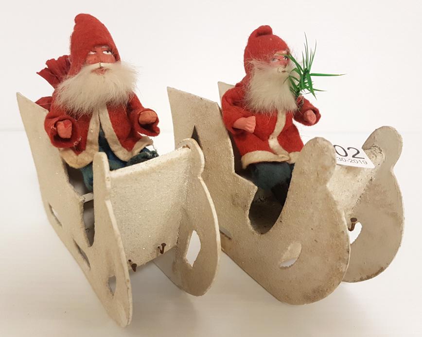 2 German papier-mache Santas in sleighs approx 7" long: 2 German papier-mache Santas in sleighs approx 7" long