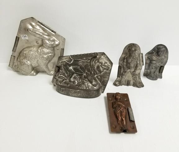 5 antique chocolate, etc. molds - lion, bunny, people -: 5 antique chocolate, etc. molds - lion, bunny, people - one is copper - largest is 10"