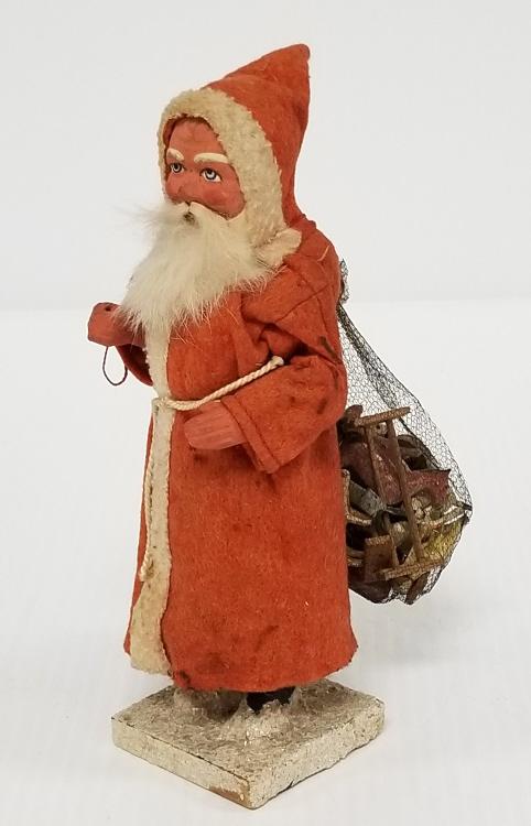 German 7 1/2" Santa figure with bag of wooden animal (1 of 11)