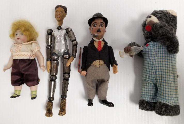 Charley Chaplin wind-up toy 6 1/2" tall, bisque doll 5 1/2" tall, wind-up bear 7" tall & marked: Charley Chaplin wind-up toy 6 1/2" tall, bisque doll 5 1/2" tall, wind-up bear 7" tall & marked Switzerland jointed metal man