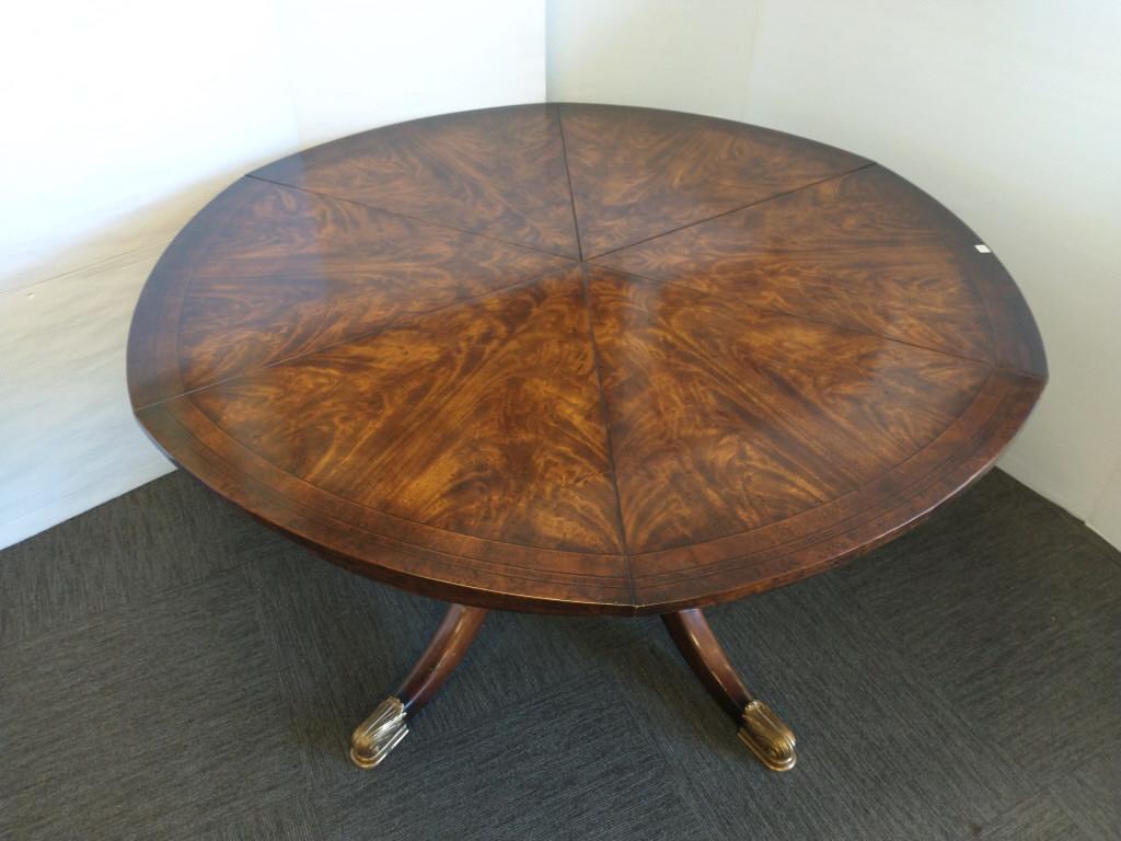 Theodore Alexander Althorp Jupe flame mahogany table with inset fold-out leaves - 60 1/2" diameter (1 of 12)