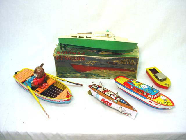5 toy boats including penguin cabin cruiser: in box…lot
