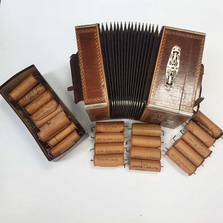 Rare antique Tanzbar player accordion with 26 rolls (1 of 9)