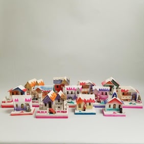 13 assorted vintage Japan cardboard Christmas village houses - some with bisque figures including