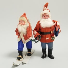 2 vintage German Santas with papier-mache blue pants - 1 on skies (repaired) & 1 candy container