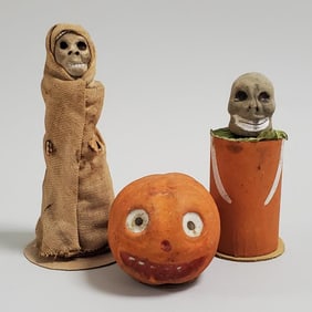 2 vintage skull candy containers 3 1/2" & 4 1/4" (does not open) & a vintage 2" pumpkin head