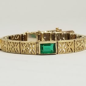 14K gold filigree antique bracelet set with green stones (one chipped) 13.7 grams; 6 1/4" long