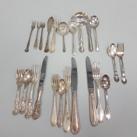 23 pieces of assorted sterling silver flatware (4 hollow handles only) including Kirk & Son, Tuffle,