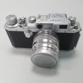 Vintage Canon camera No. 78672 with 50mm lens