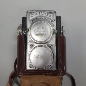 Zeiss Ikon Contaflex twin lens camera in leather case (case torn)